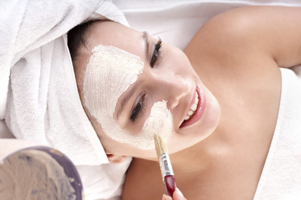 iStock 000012195961Medium 1024x682 - Cosmetician make mask. Facial massage. -